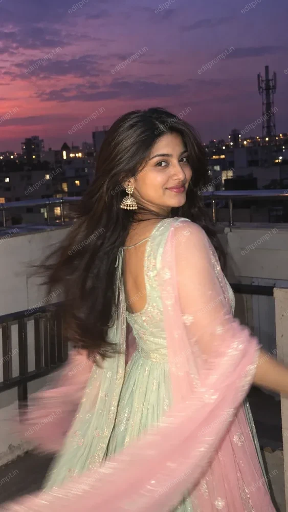 Traditional look back pose AI photo prompt - girl in a mint anarkali looking over her shoulder on a city rooftop at dusk, pink dupatta in motion