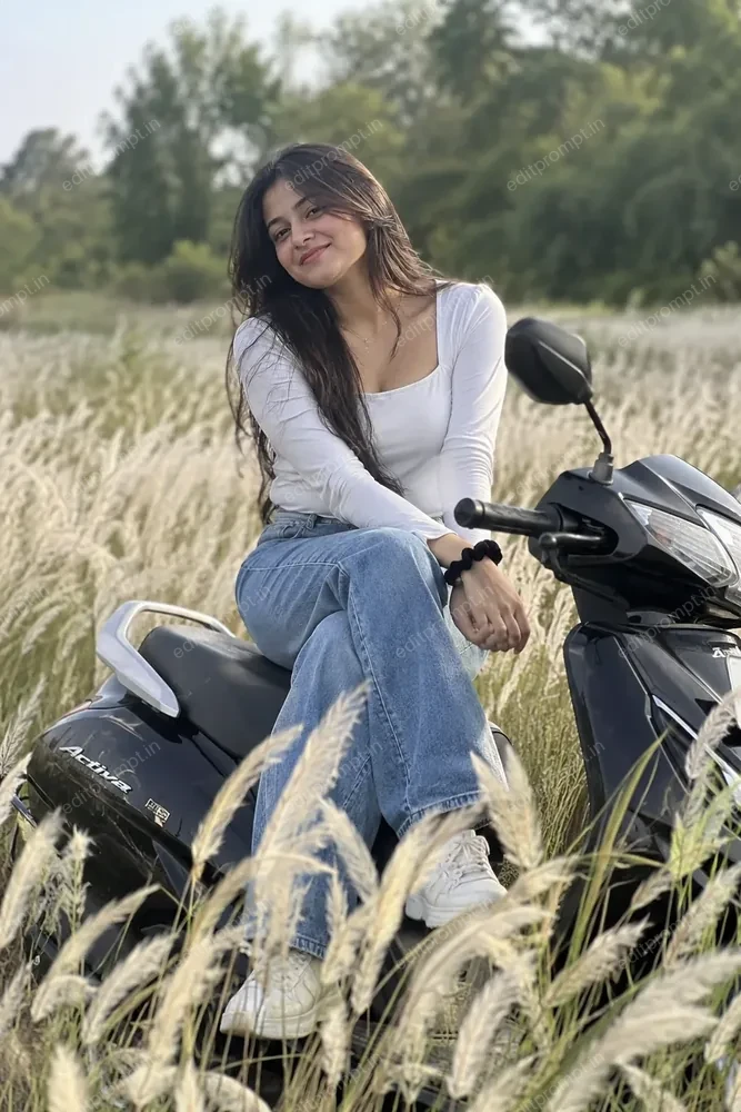 Aesthetic scooter photo prompt — girl in white top and blue jeans sitting on a black scooter in a white grass field