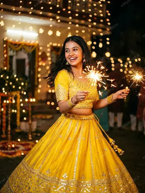 AI Diwali photo of a woman in a yellow mirror-work lehenga holding phuljhadi sparklers at night